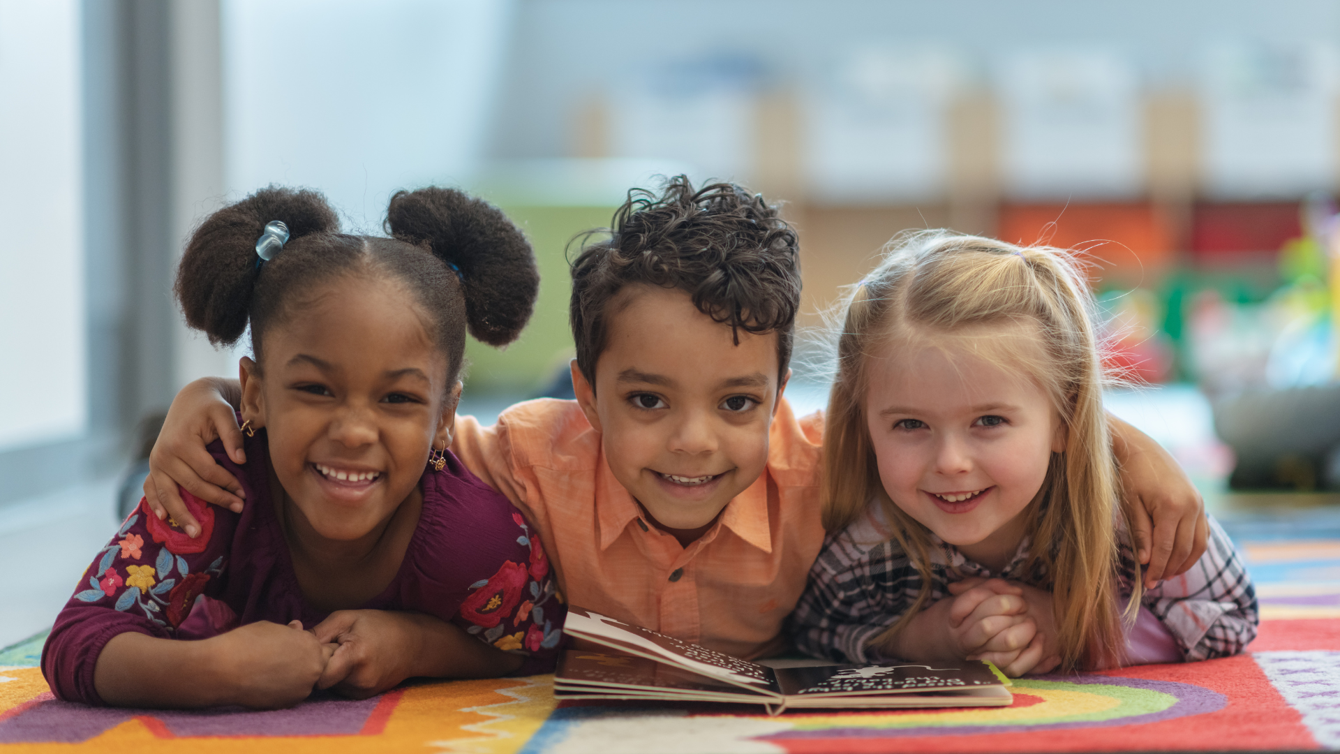 3 children reading to practice comprehension skills